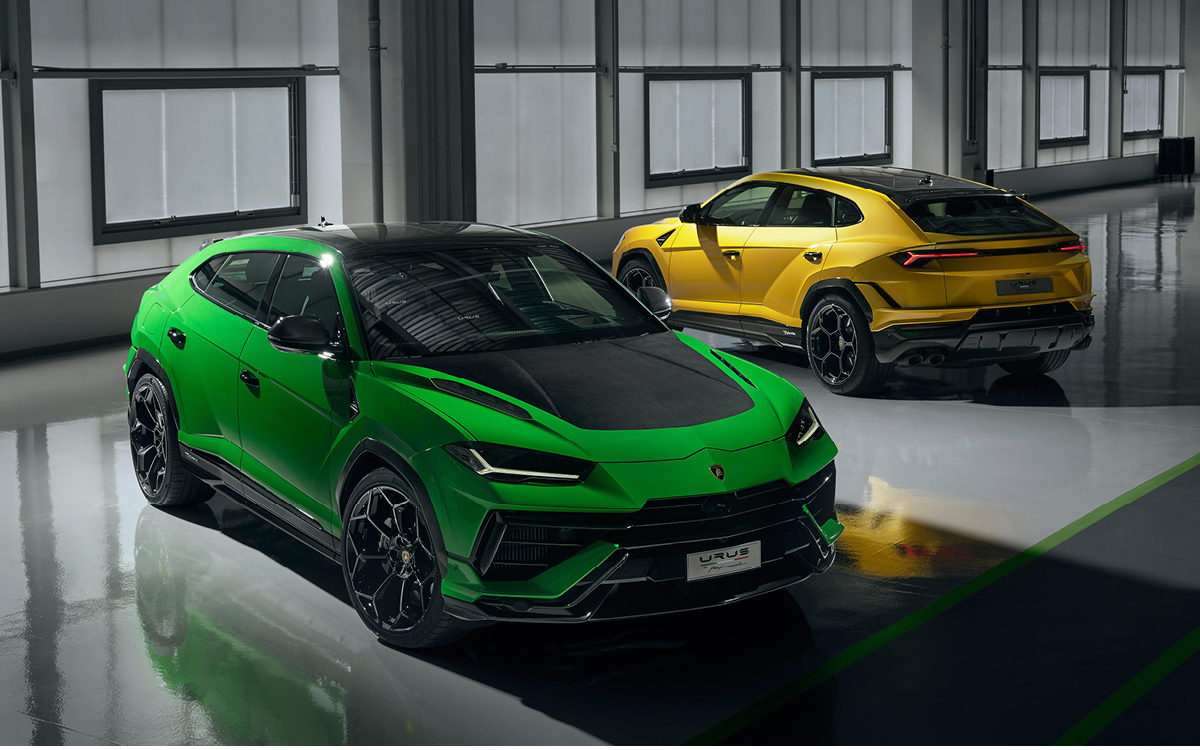 Yellow and green Lamborghini Urus models in garage