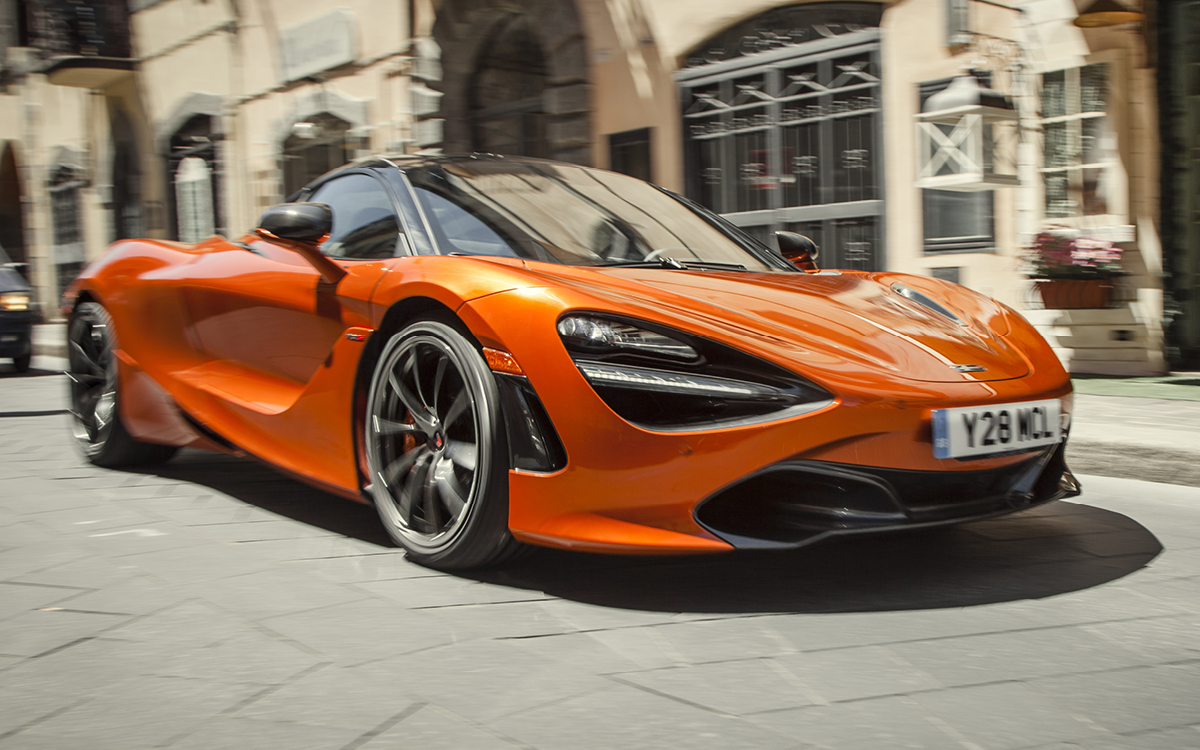 Orange McLaren 720S on street