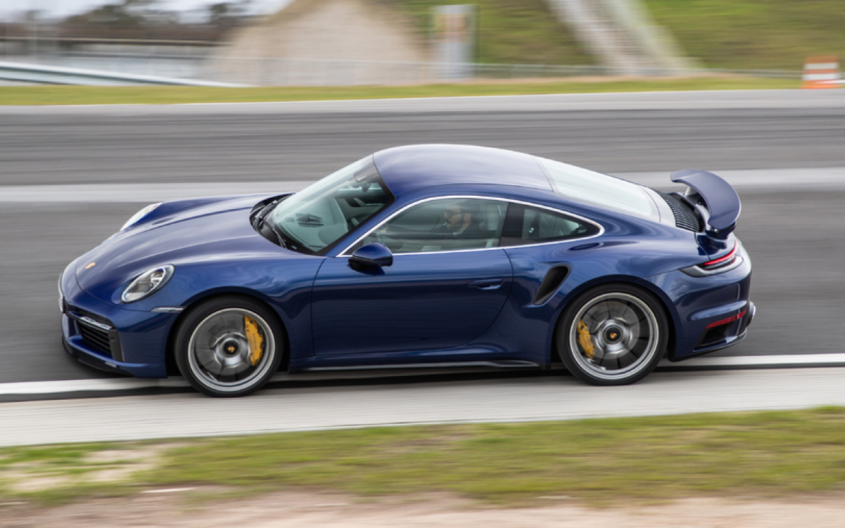Blue Porsche 911 Turbo S on track