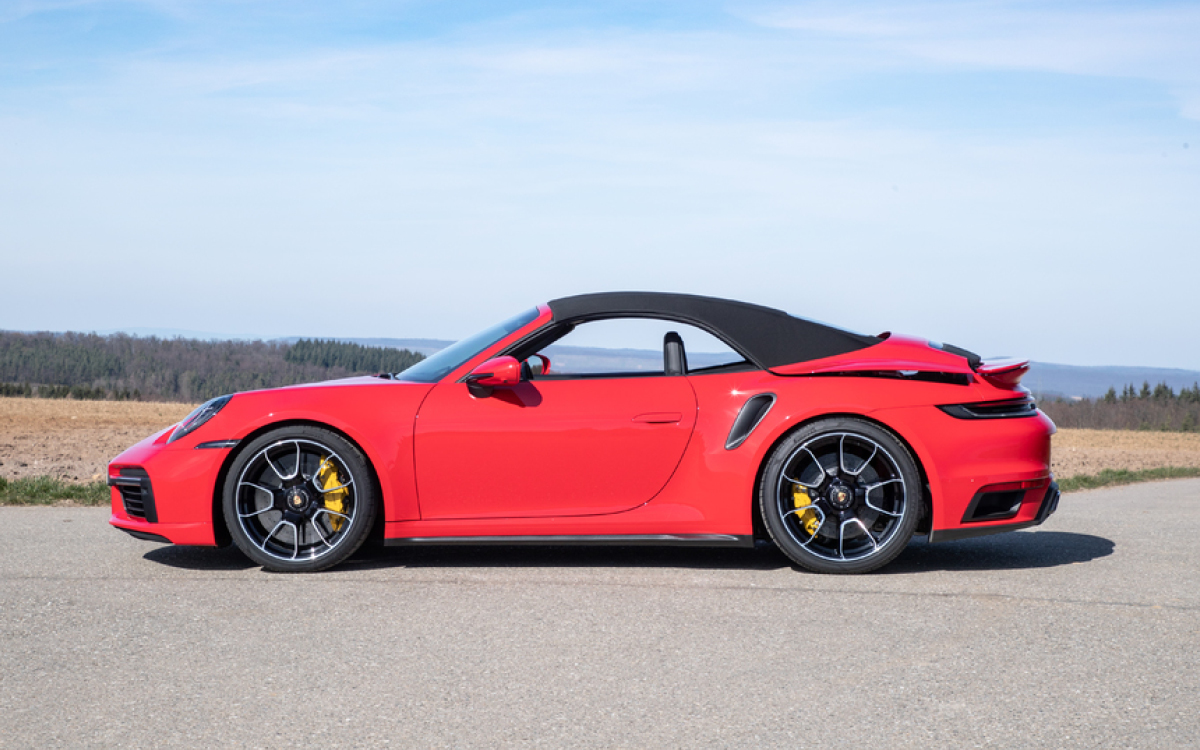 Red Porsche 911 Turbo S Cabriolet top up view