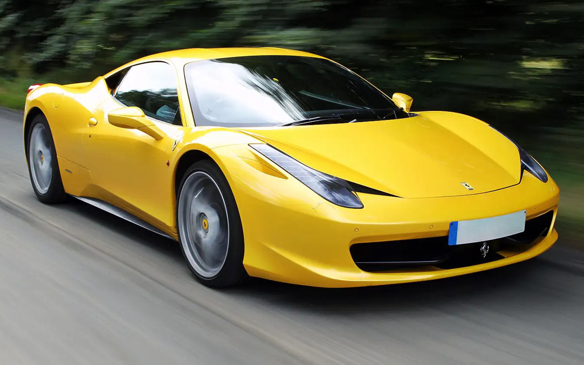 Red Ferrari 458 Italia on road