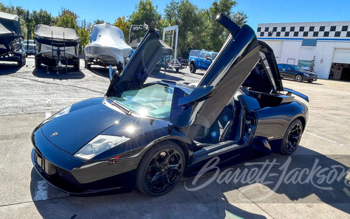 Black Lamborghini Murciélago Roadster at Barrett-Jackson auction.