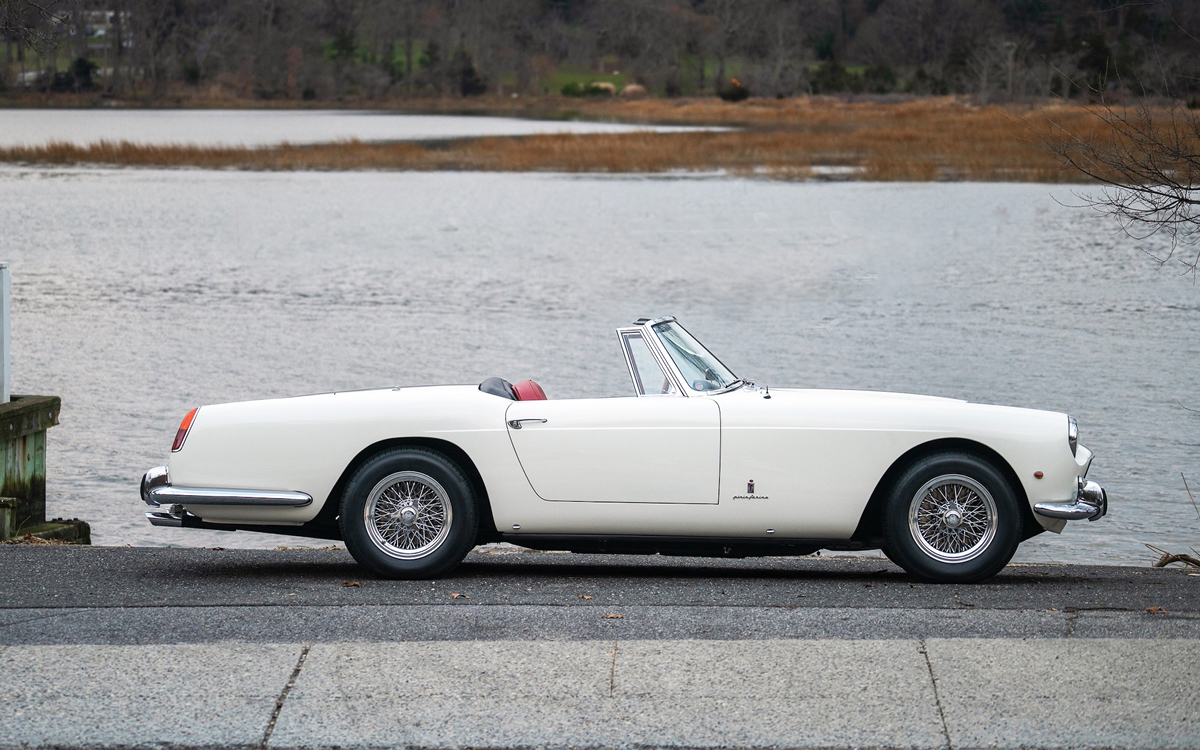 RM-1961-Ferrari-250-GT-Cabriolet-3 Squint, and you can see how MG took some inspiration from the design for its popular MGB roadster. White 1961 Ferrari 250 GT Cabriolet Series II right side profile view Erik Fuller ©2023 Courtesy of RM Sotheby’s