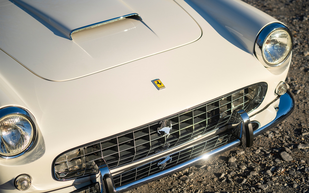 RM-1961-Ferrari-250-GT-Cabriolet-6 The wide egg-crate grill was a hallmark feature of the period’s Pininfarina-designed Ferraris. White 1961 Ferrari 250 GT Cabriolet Series II front detail view Erik Fuller ©2023 Courtesy of RM Sotheby’s