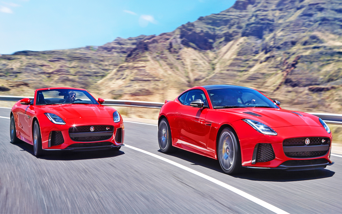 Red Jaguar F-Type coupe and convertible on the road
